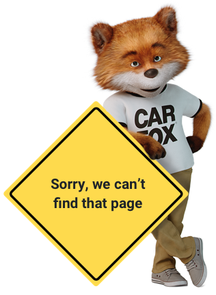 CAR FOX leaning against a caution sign with 'Sorry, we can't find that page' written on it.